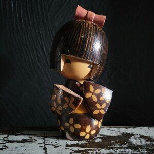 Vintage 1970s Japanese Kokeshi Doll By Tomio Ishida Wood Painted Red Bow 5.5"